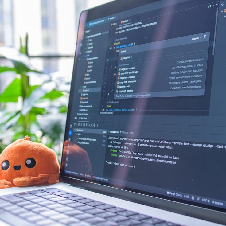 Mobile app project planning workspace with devices and development tools